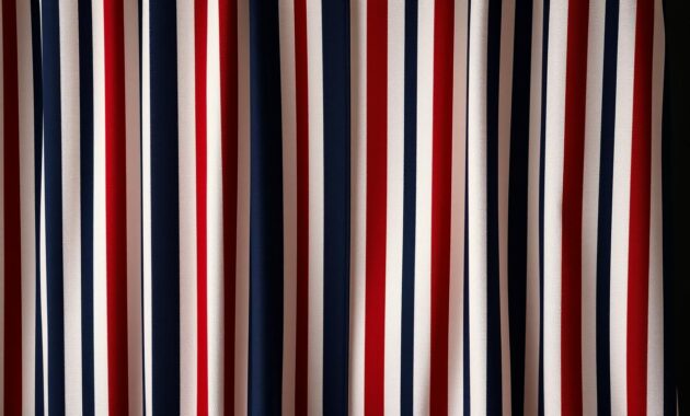 A stylish arrangement of vertical stripes dominates the foreground, showcasing a harmonious blend of elegant colors such as deep navy, vibrant red, and crisp white. The stripes create a dynamic pattern that draws the eye upward, symbolizing height and sophistication. In the middle, soft lighting casts a warm glow over the ensemble, highlighting the texture of the fabric, which appears luxurious and smooth. The background features a subtle gradient that transitions from light to dark, enhancing the overall depth of the image. The mood is one of empowerment and fashion-forward thinking, perfect for petite women looking to embrace vertical lines. The entire composition conveys a sense of refinement and modernity, ideal for illustrating the fashion tips section. A stylish arrangement of vertical stripes dominates the foreground, showcasing a harmonious blend of elegant colors such as deep navy, vibrant red, and crisp white. The stripes create a dynamic pattern that draws the eye upward, symbolizing height and sophistication. In the middle, soft lighting casts a warm glow over the ensemble, highlighting the texture of the fabric, which appears luxurious and smooth. The background features a subtle gradient that transitions from light to dark, enhancing the overall depth of the image. The mood is one of empowerment and fashion-forward thinking, perfect for petite women looking to embrace vertical lines. The entire composition conveys a sense of refinement and modernity, ideal for illustrating the fashion tips section.